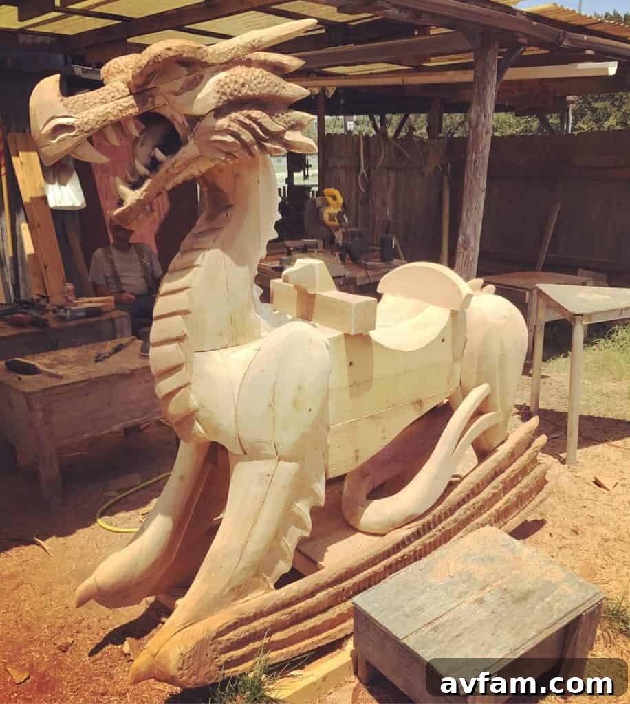 Close-up of a detailed wood carving by Griffon Ramsey, showcasing the intricate textures and forms achievable with chainsaw art. The craftsmanship highlights the artist's skill and vision.