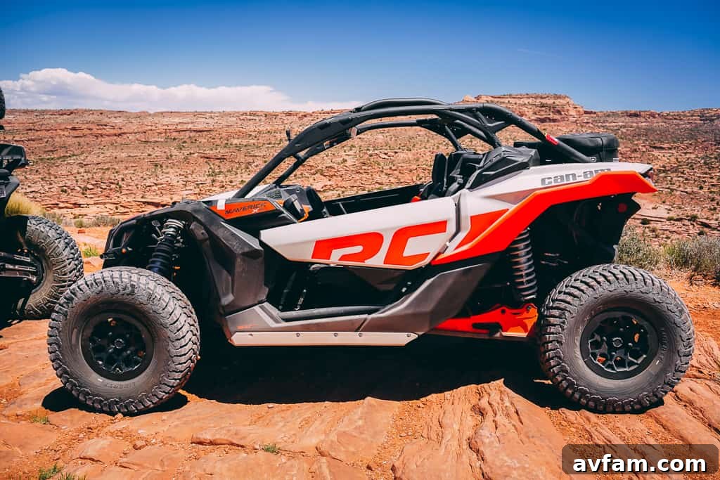 can-am maverick x3 side by side driving on red rock