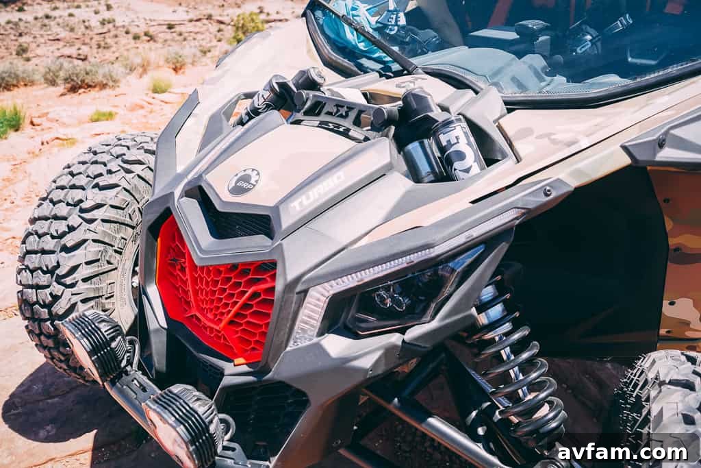 can-am maverick x3 in a dusty turn