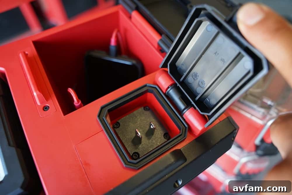 Close-up of the USB charging port on the Milwaukee M18 Packout Light.