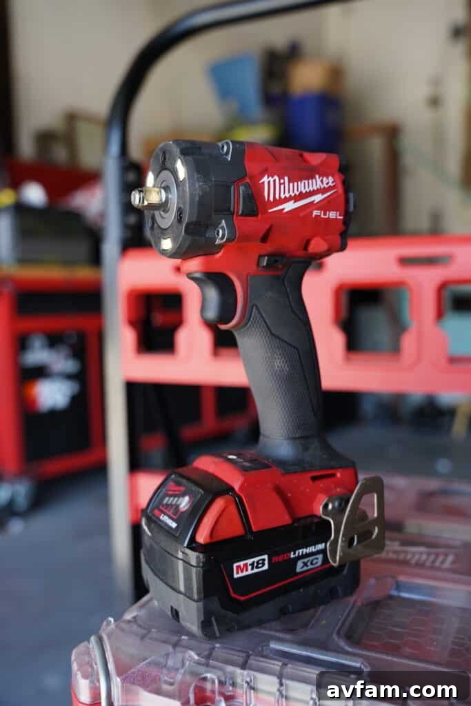 Milwaukee M18 Fuel 3/8 inch Compact Impact Wrench in action