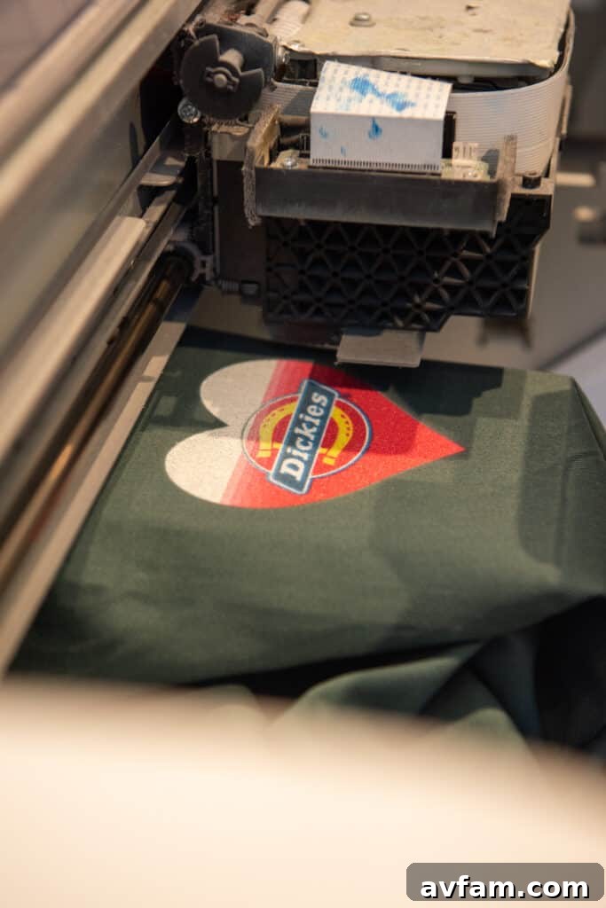 Artist working on custom Dickies apparel at the Fred Segal pop-up