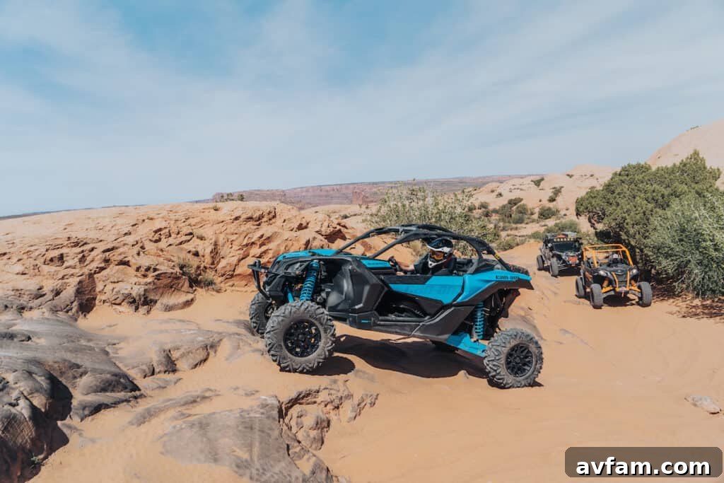Maverick X3 Suspension Performance Side view of the Can-Am Maverick X3 showing its long-travel suspension in action.