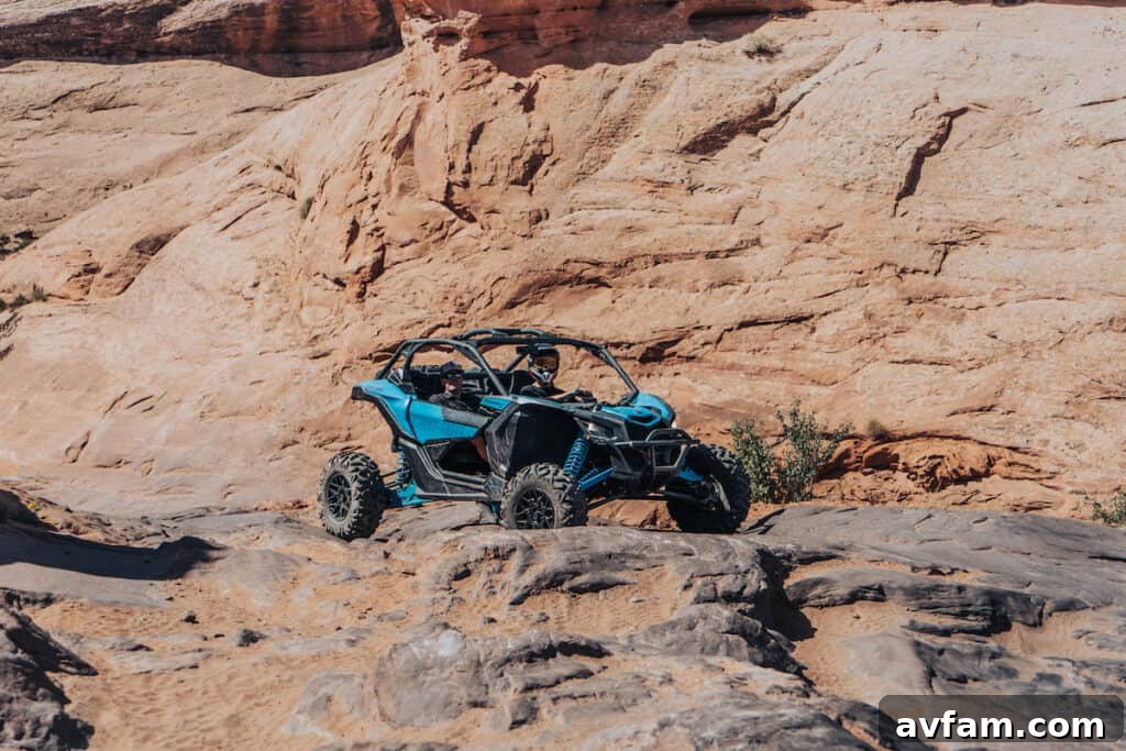 Maverick X3 at Rock Arch The custom Can-Am Maverick X3 parked near a natural rock arch in Moab.