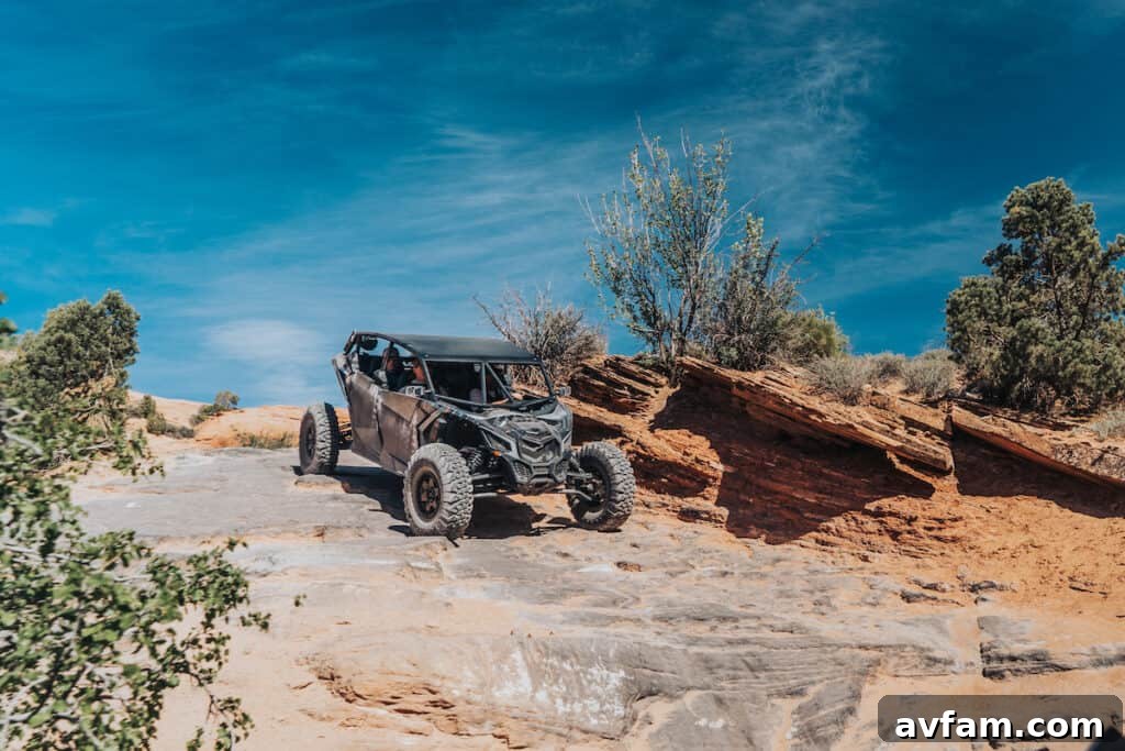 Maverick X3 with Rooftop Tent Can-Am Maverick X3 parked with its James Baroud rooftop tent deployed for camping.