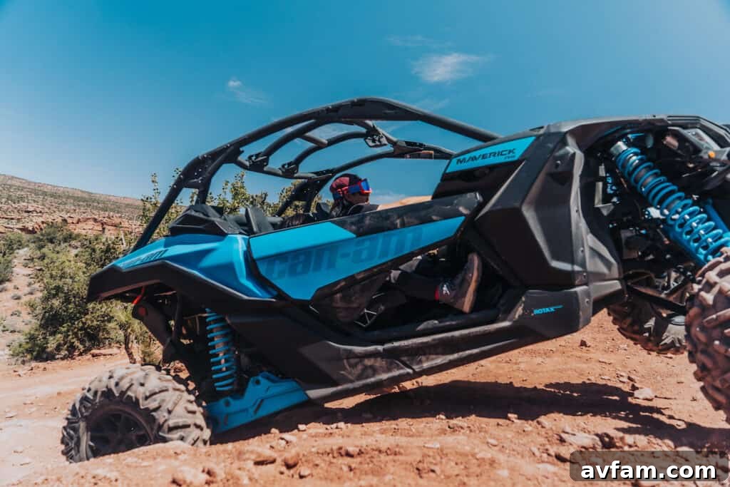 Maverick X3 Action Shot Side view of the Can-Am Maverick X3 in action on an open trail.