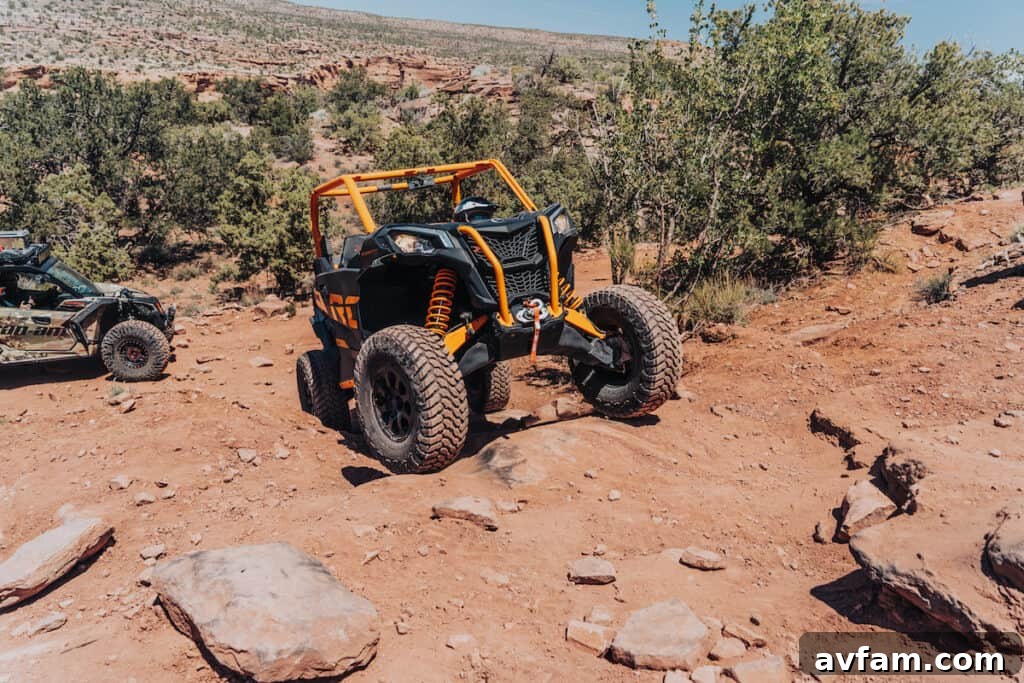 Maverick X3 with DMOS Shovel The custom Can-Am Maverick X3 with its integrated DMOS Collective shovel for recovery.