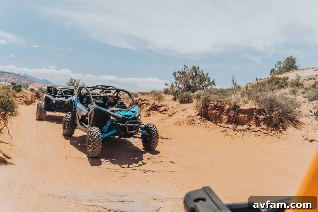 Maverick X3 Dusty Turn Can-Am Maverick X3 emerging from a dusty turn, showcasing its powerful performance.