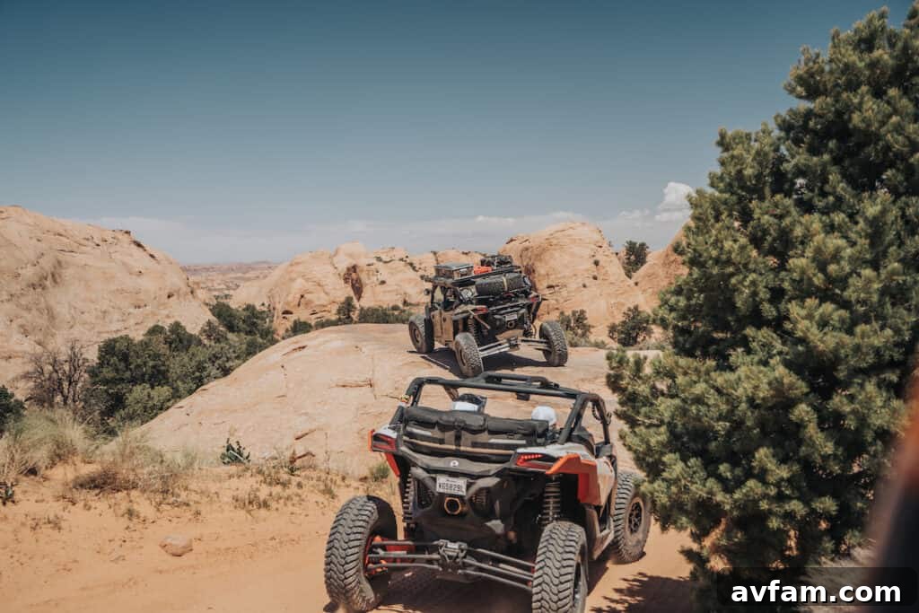 Maverick X3 Precision Rock Crawling Can-Am Maverick X3 navigating a challenging rocky section with precision.