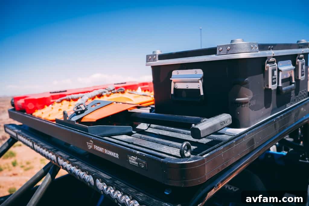 Overland Setup on Maverick X3 Can-Am Maverick X3 showcasing its Front Runner Outfitters roof rack and James Baroud rooftop tent.