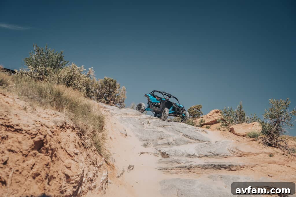 Maverick X3 Rough Terrain The custom Can-Am Maverick X3 with its high-clearance design traversing rough terrain.
