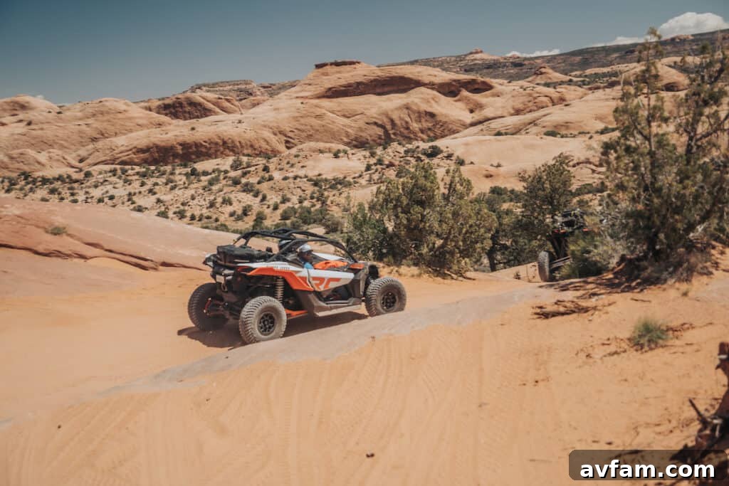 Maverick X3 Canyon Drive Can-Am Maverick X3 driving through a picturesque canyon in Moab.