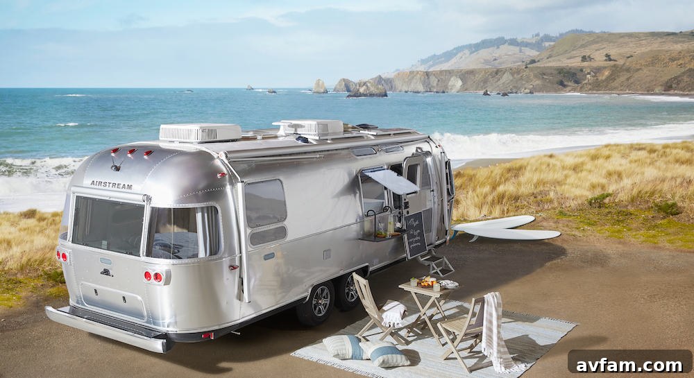 The iconic polished aluminum exterior of the 28-foot Airstream Pottery Barn Special Edition Travel Trailer, parked in a scenic outdoor setting.