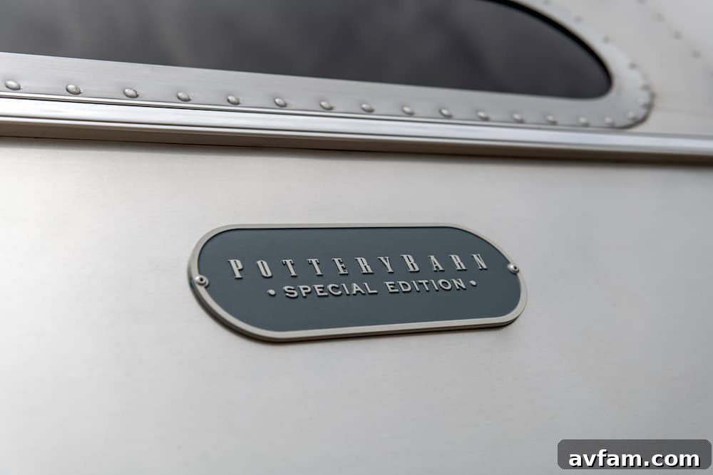 The elegant bathroom vanity in the Airstream Pottery Barn trailer, featuring a modern vessel sink and sleek matte-black fixtures.