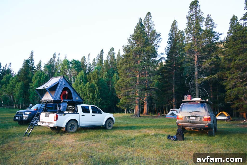 CVT Mt. Hood Outdoor Setup The CVT Mt. Hood hardshell tent standing prominently on a vehicle against a natural backdrop