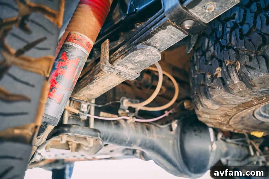 The 2021 Tacoma TRD Pro driving on an unpaved road, showcasing its capability