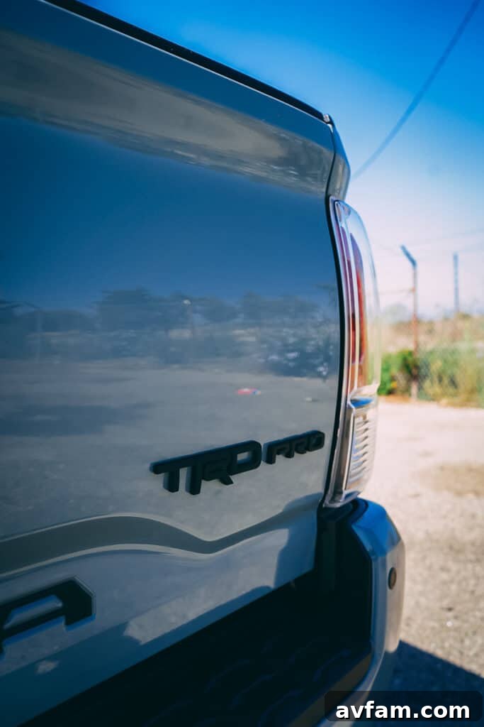 Action shot of the 2021 Tacoma TRD Pro navigating a dirt trail