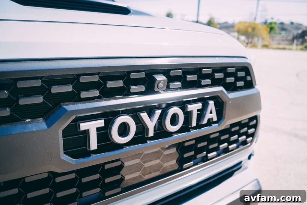 Close-up of the 2021 Tacoma TRD Pro's tire and wheel on rugged terrain