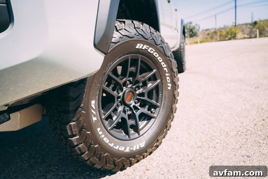 The 2021 Tacoma TRD Pro with its headlights on during an evening drive