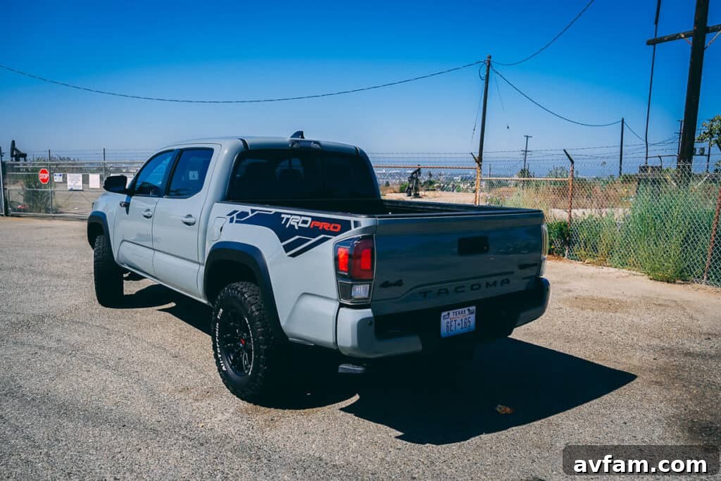 Rear view of the 2021 Toyota Tacoma TRD Pro with its taillights illuminated