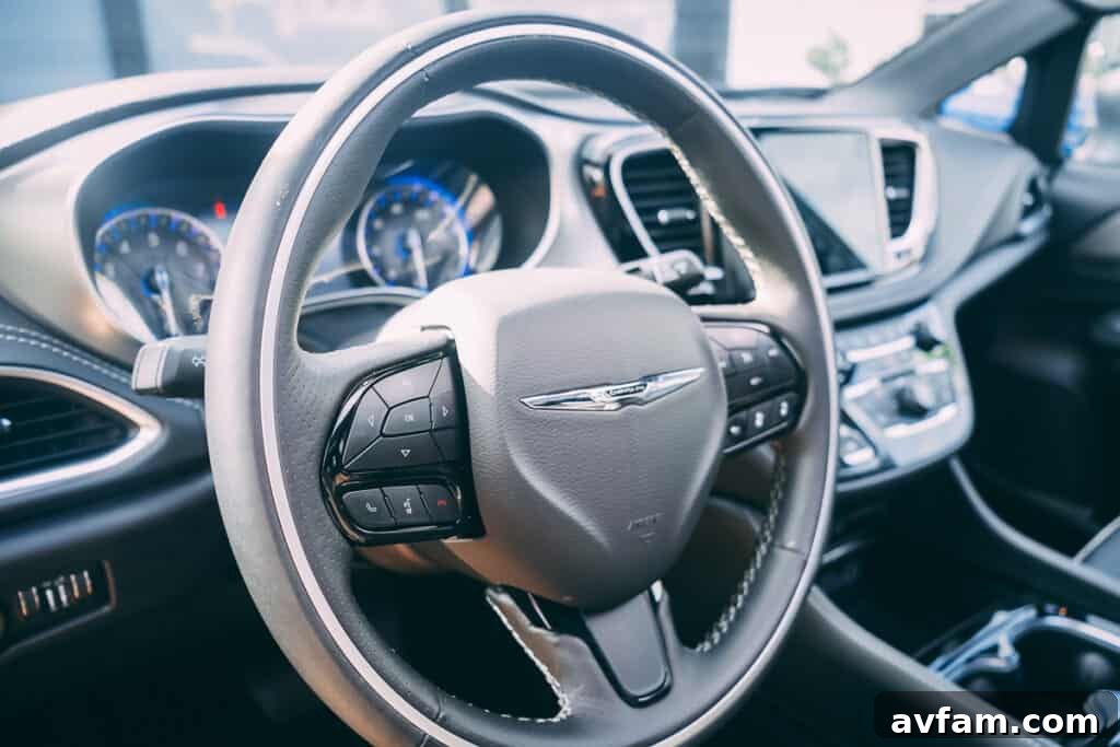 2021 Chrysler Pacifica parked outdoors, showcasing its modern front fascia and sleek design.