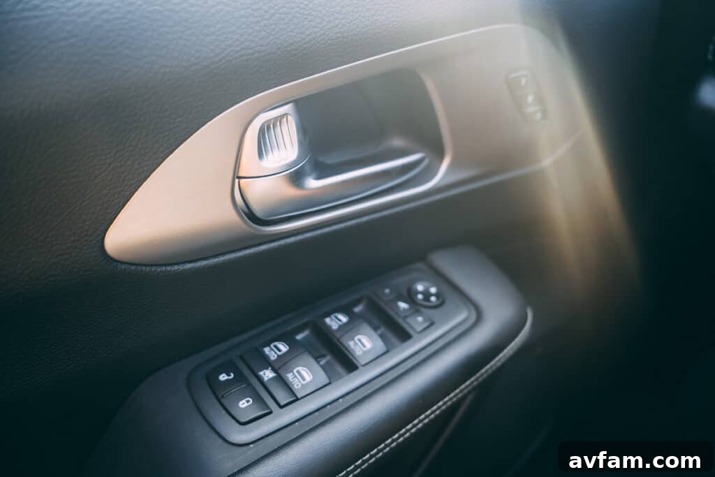 Image of the Pacifica's climate control panel and center console.