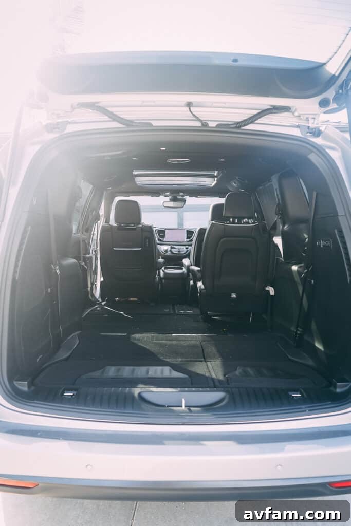 The Pacifica's stylish headlight assembly with integrated LED daytime running lights.