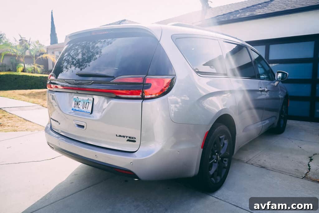 The Pacifica's side mirrors with integrated turn signals and blind-spot monitoring indicator.