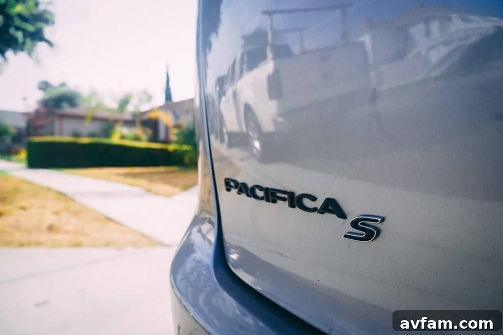 The refined rear bumper and exhaust outlet of the Chrysler Pacifica.