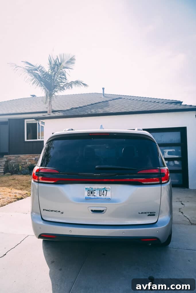 An expansive view of the Pacifica's interior from the rear, showing all three rows of seating.