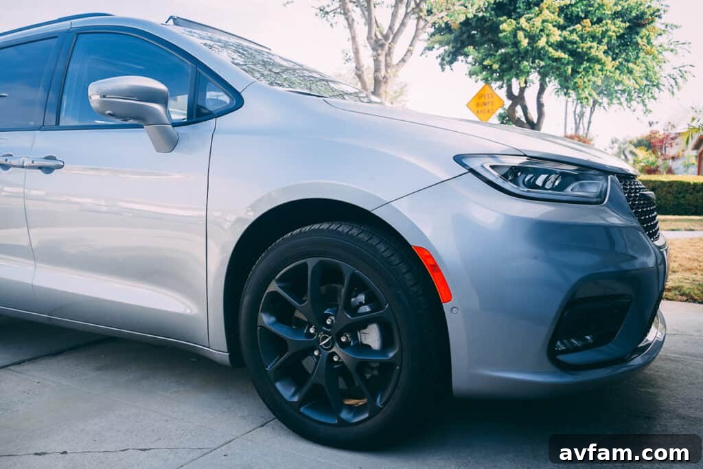The Pacifica's spacious footwell and floor mats in the second row.
