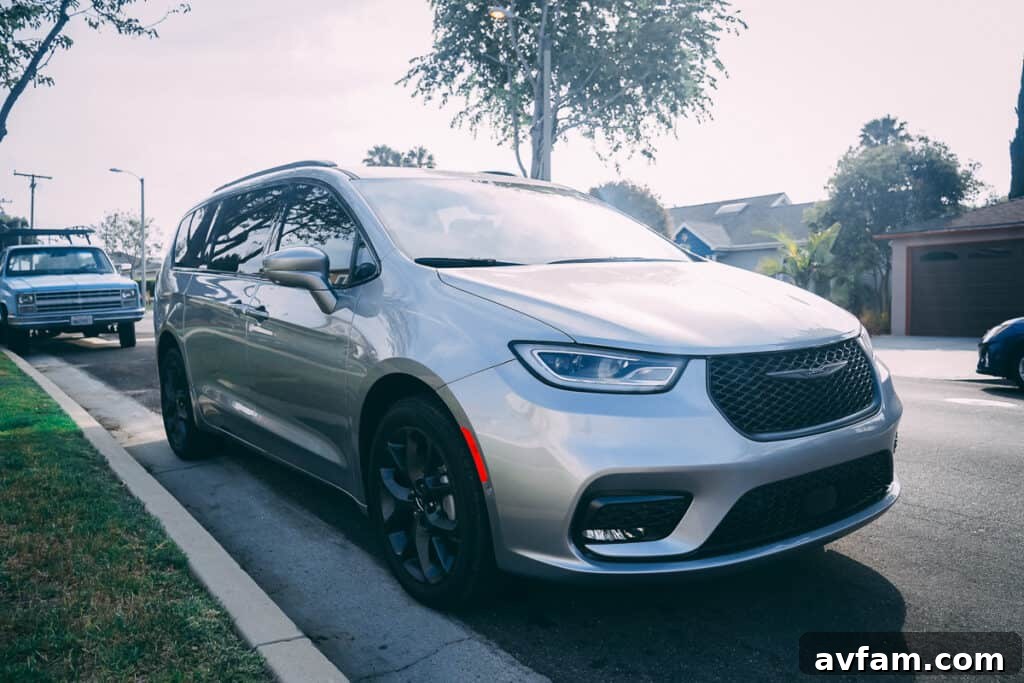 The Pacifica's convenient power sliding door opened, revealing easy cabin access.
