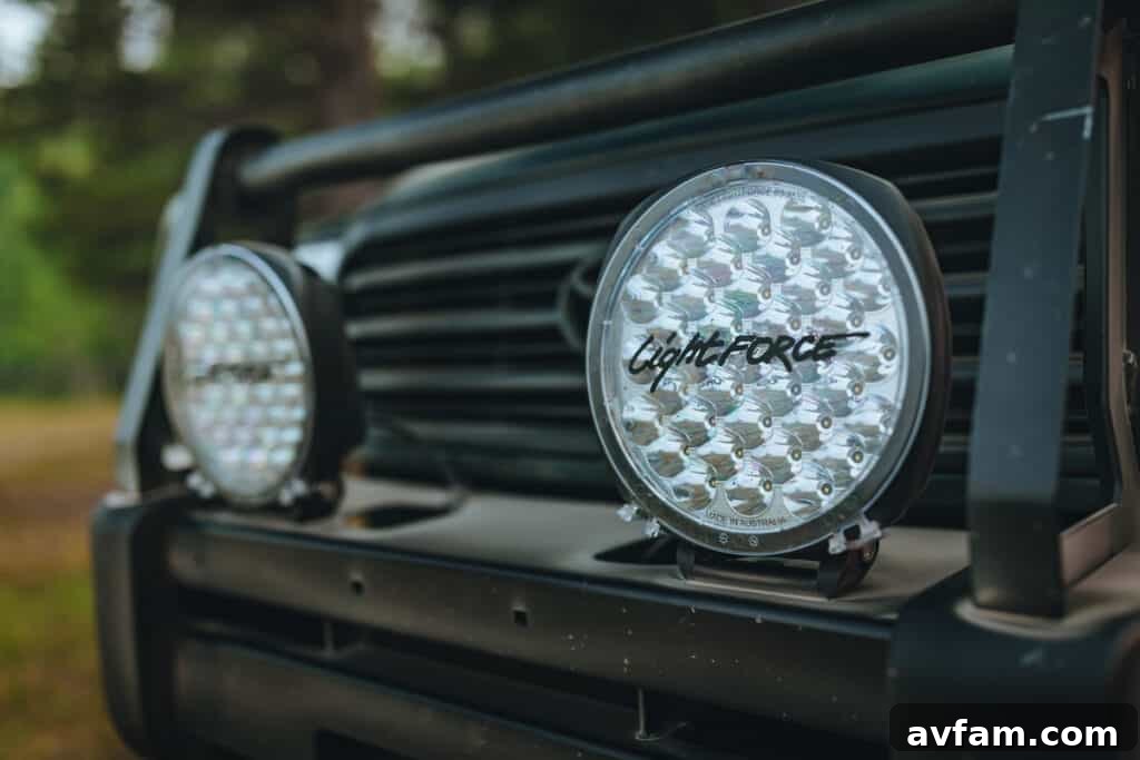 Close-up of Lightforce Genesis off-road lights mounted on an Ironman bumper of a Land Cruiser