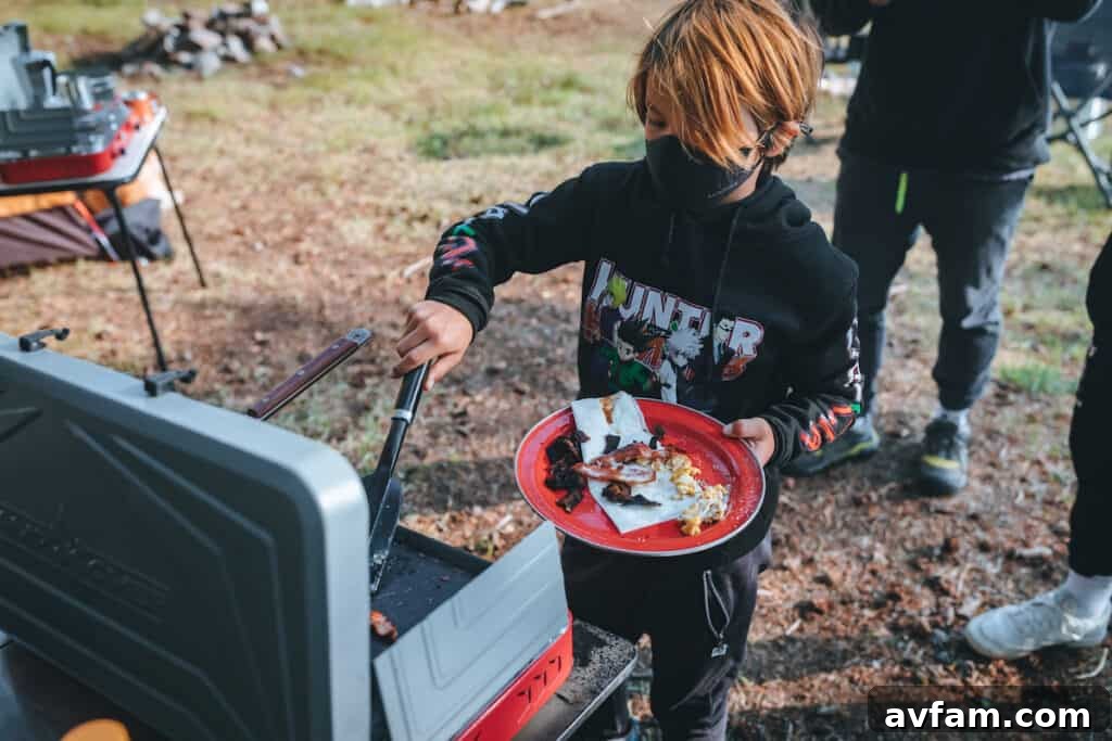 Morning coffee being brewed at a scenic campsite with Bodie Hills in the background, essential for camping