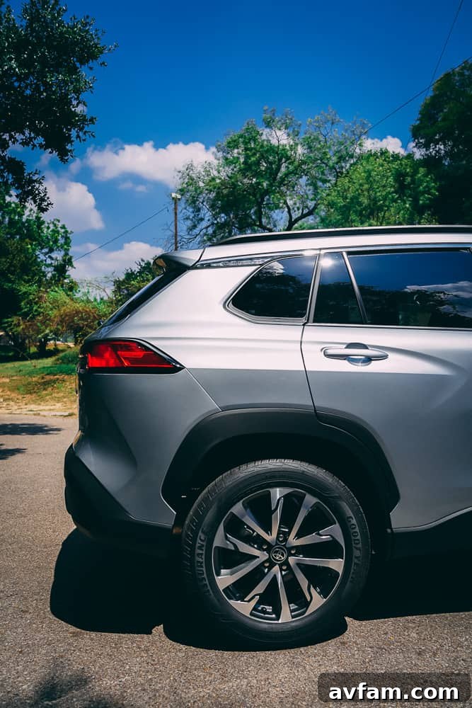 Profile view of the 2022 Toyota Corolla Cross in motion.