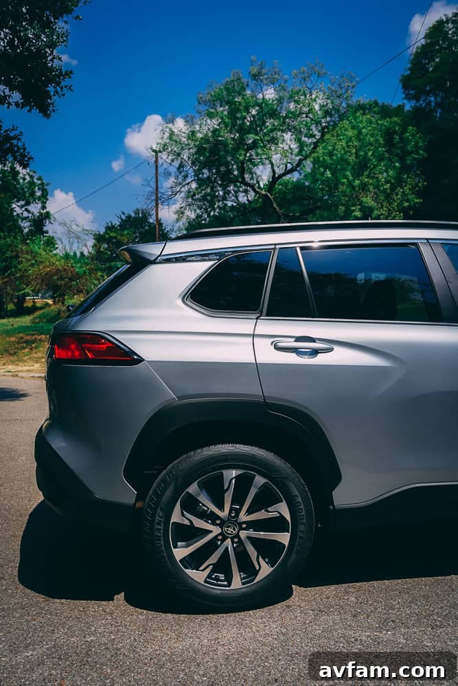 Side mirror and front window view from inside the 2022 Toyota Corolla Cross.