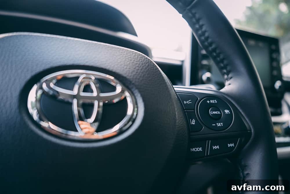 Side profile of the 2022 Toyota Corolla Cross, emphasizing its robust stance and safety features.