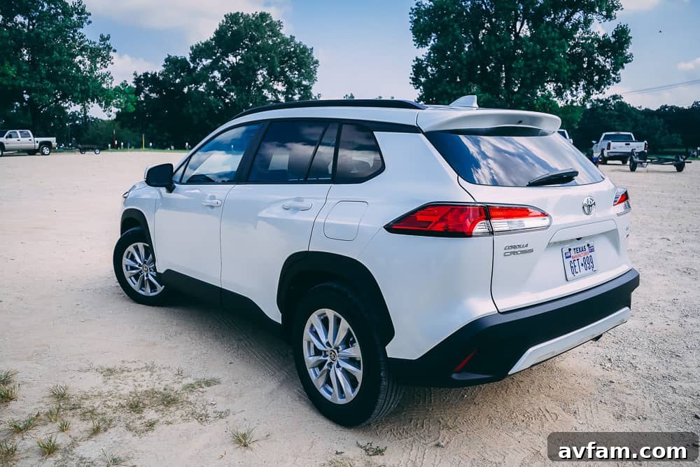 A detailed shot of the side mirror and roof rails of the 2022 Toyota Corolla Cross.