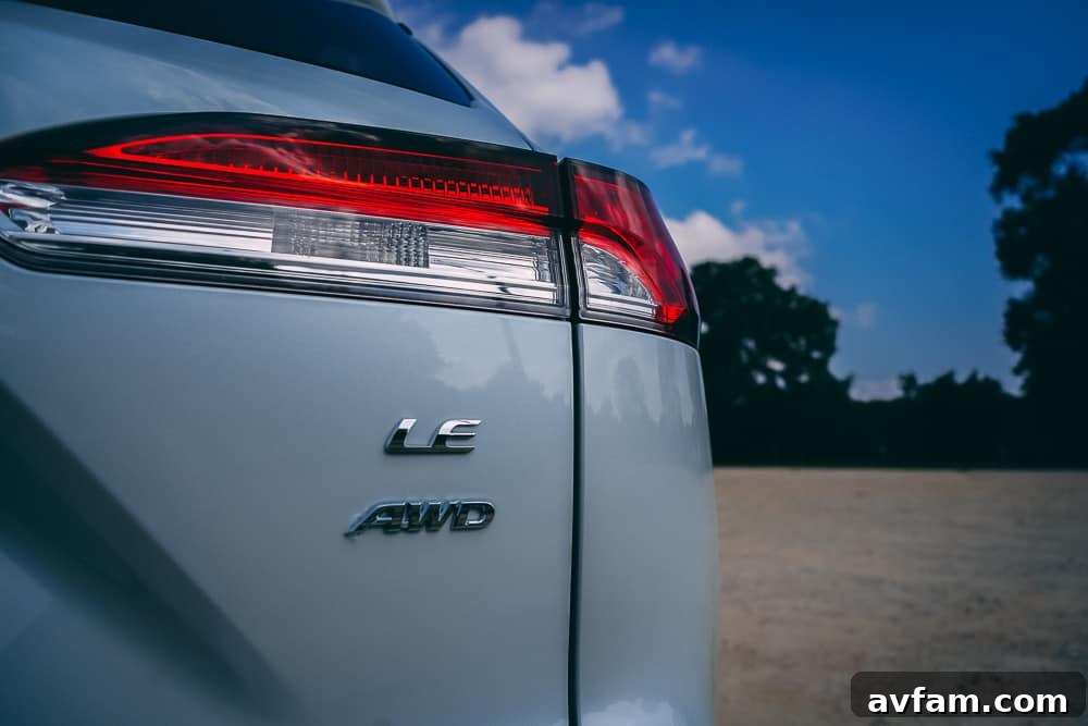 Frontal close-up of the 2022 Toyota Corolla Cross grille and Toyota emblem.