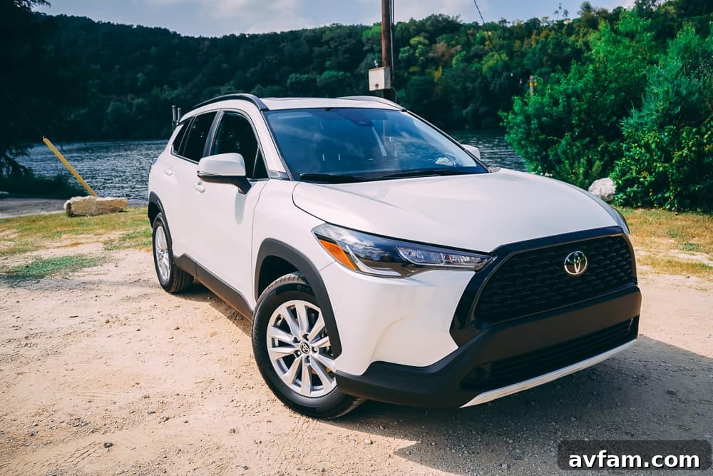 The 2022 Toyota Corolla Cross in an outdoor setting, emphasizing its all-wheel drive capability and rugged appeal.