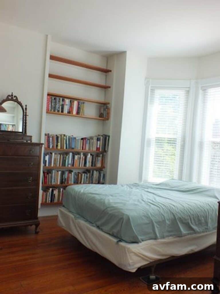 Richmond Restoration: A Historic House Reborn 13 Before renovation: Front master bedroom with built-in bookshelves in an old Richmond VA house