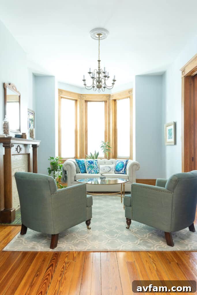 Richmond Restoration: A Historic House Reborn 19 After renovation: Bright front parlor with new traditional chandelier in a Richmond VA historic home