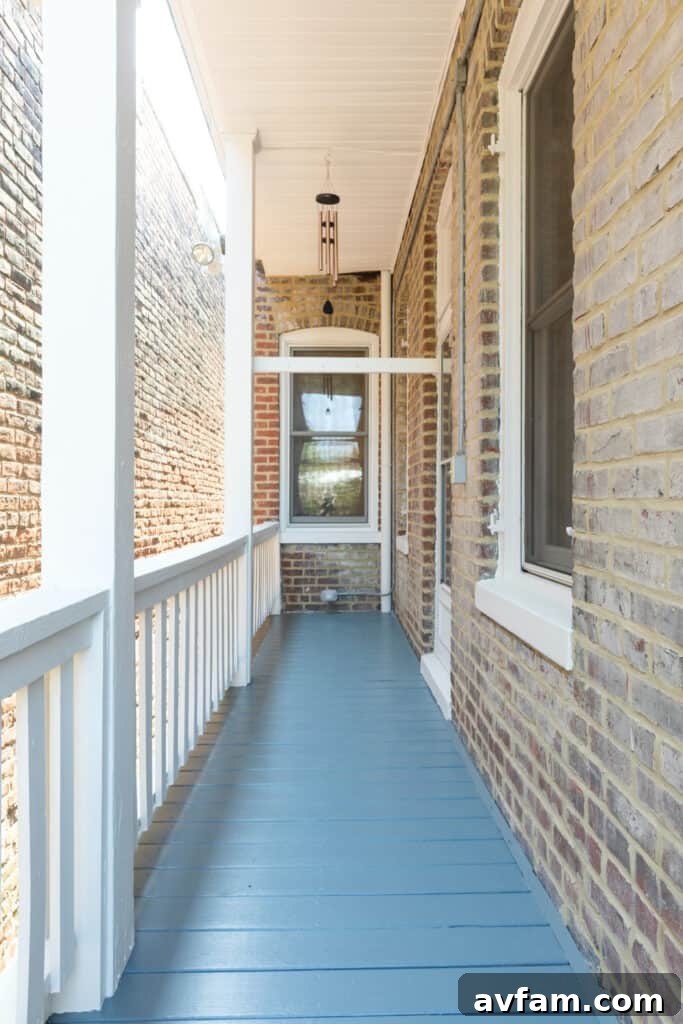 Richmond Restoration: A Historic House Reborn 29 After renovation: Freshly painted upstairs hallway with bright recessed LED lights in a historic Richmond VA home