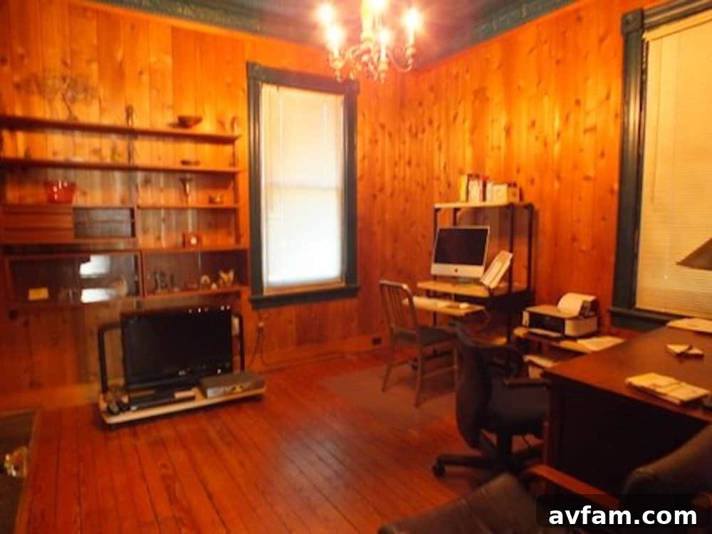 Richmond Restoration: A Historic House Reborn 7 Before renovation: Dark paneled office with tin ceiling in a Richmond VA home