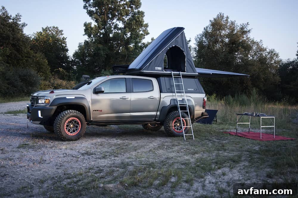 Rear view of the GMC Canyon AT4 Overland Concept showing the spare tire swivel mount and bed setup