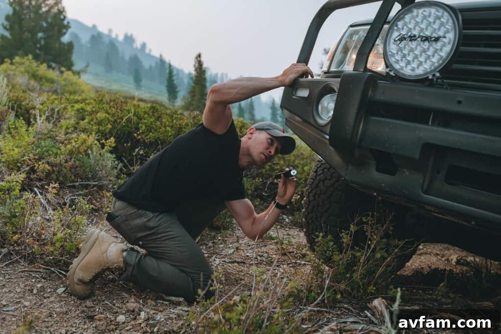 Defender Flex Range Tactical Pant: Performance Review Person wearing 5.11 Defender Flex Range Tactical Pants while kneeling outdoors
