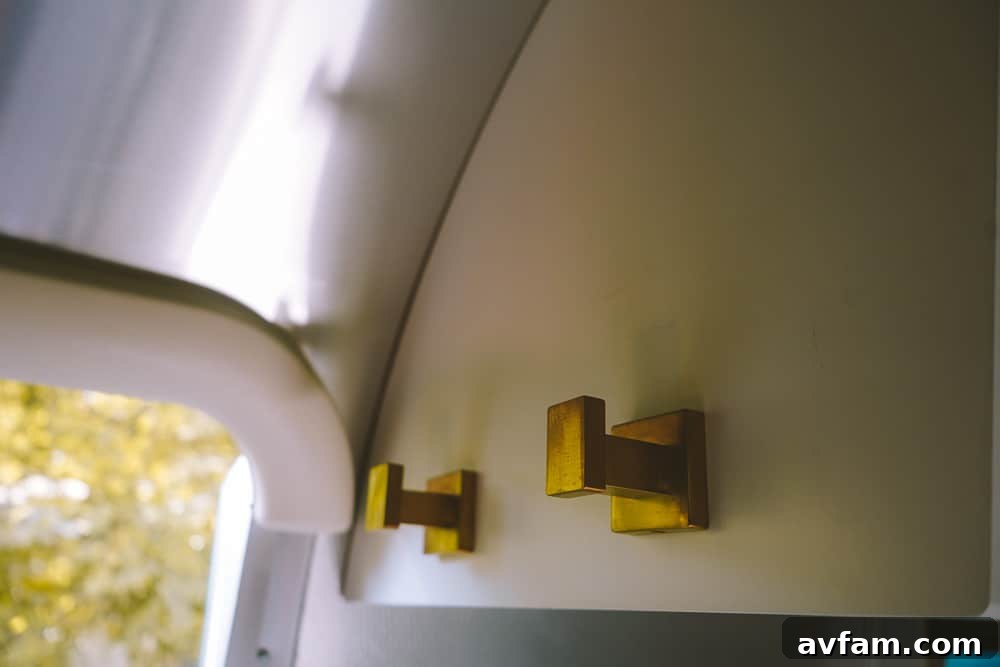 The entrance door of an Airstream, inviting guests into their luxurious retreat.