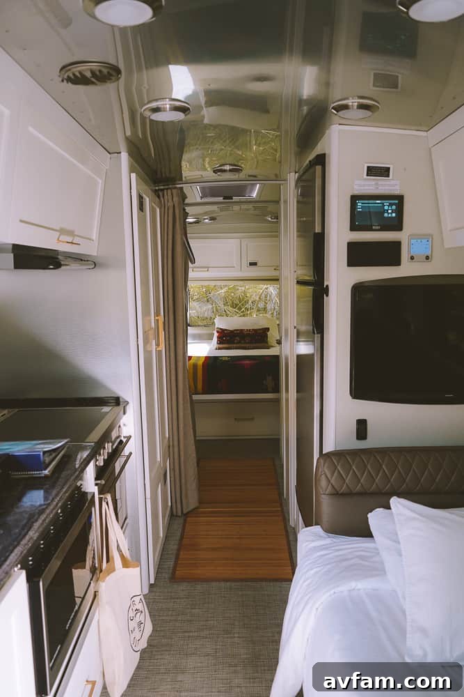 A close-up of the Airstream's exterior, focusing on its iconic rounded design.