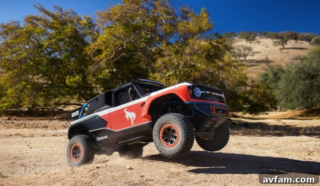 Ford Bronco DR: Conquer Baja Dreams 24 Wide shot of the Ford Bronco DR driving through a vast desert landscape
