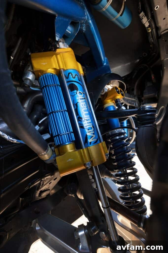 Ford Bronco DR: Conquer Baja Dreams 4 Close-up of the Ford Bronco DR's suspension components and robust tires